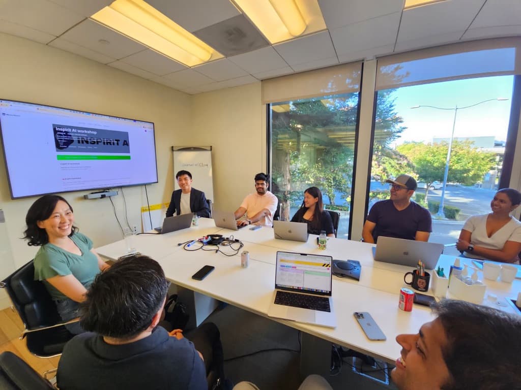 Participants engaged in hands-on AI coding session